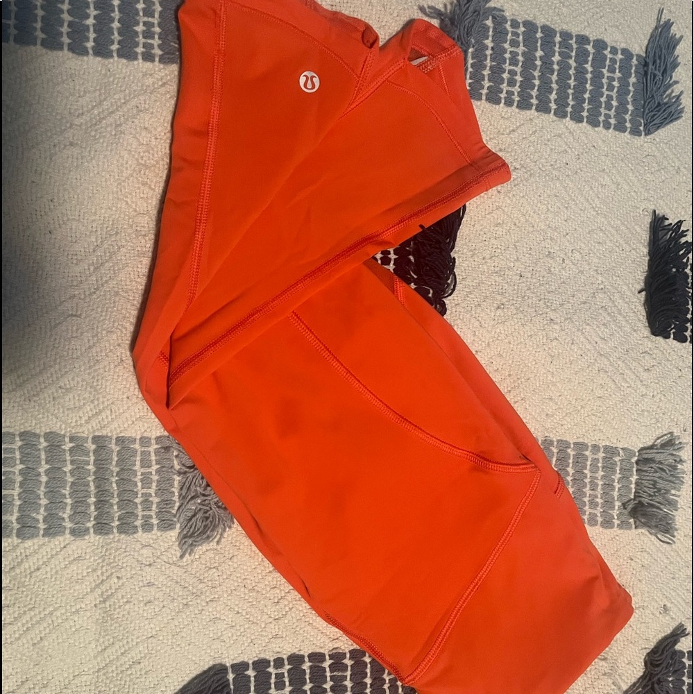 Lululemon capri size 4. Bright Coral